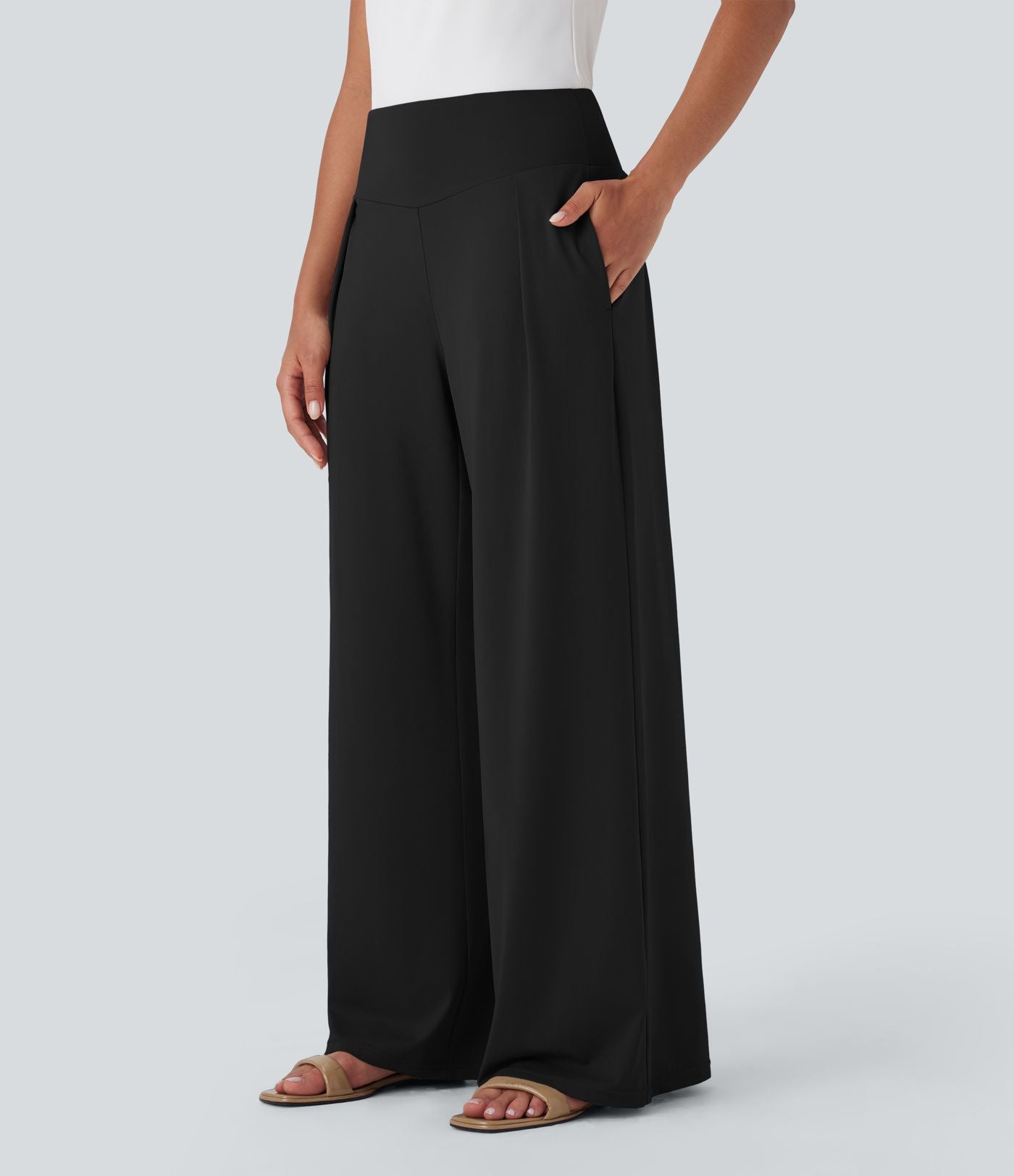 Pantalon large fluide taille haute avec poches latérales