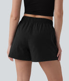 Short casual ample séchage rapide taille mi-haute aspect froissé avec poches à rabat