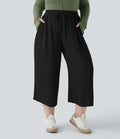 Pantalon grande taille large fluide taille haute avec cordon de serrage, poches et aspect lin