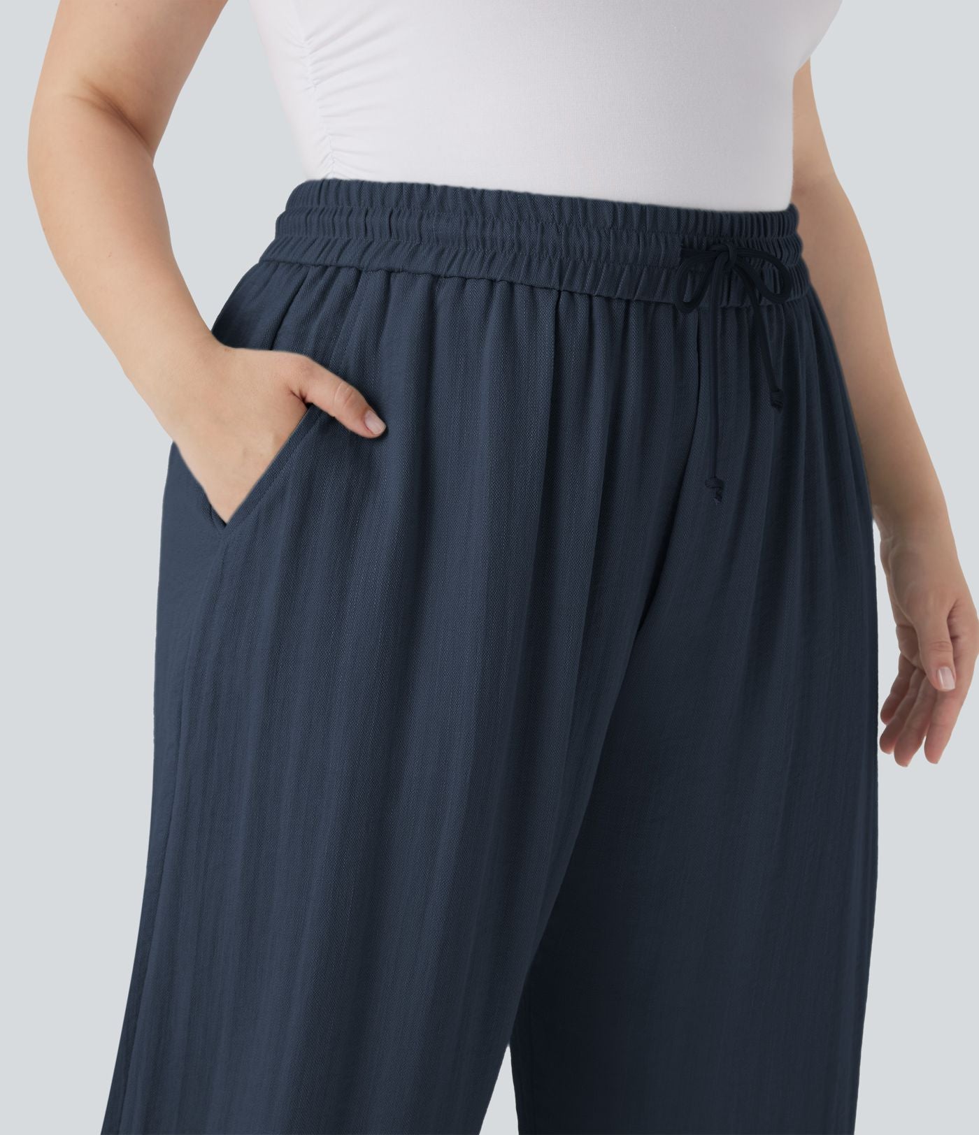 Pantalon décontracté grande taille large fluide taille haute effet lin avec cordon de serrage et poches