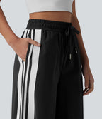 Pantalon large de course taille haute effet frais InstantCool à séchage rapide, color block à rayures avec nœud, cordon de serrage et poches, protection solaire UPF40+