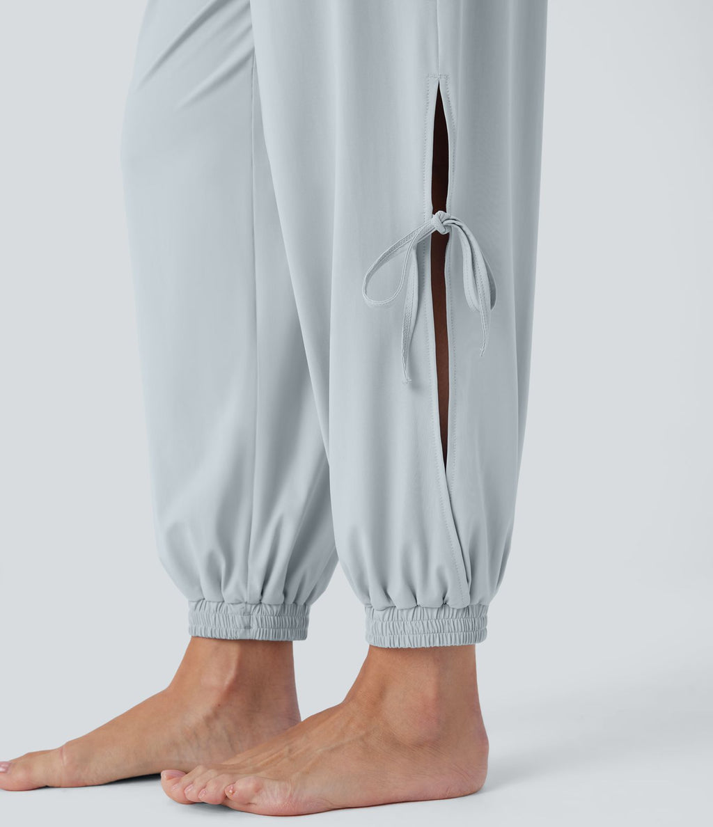 Combinaison de yoga col bateau sans manches dos nu avec découpes et poches latérales à cordon de serrage effet frais InstantCool, protection solaire UPF50+