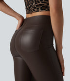 Pantalon décontracté taille haute, coupe bootcut, en PU extensible avec poches