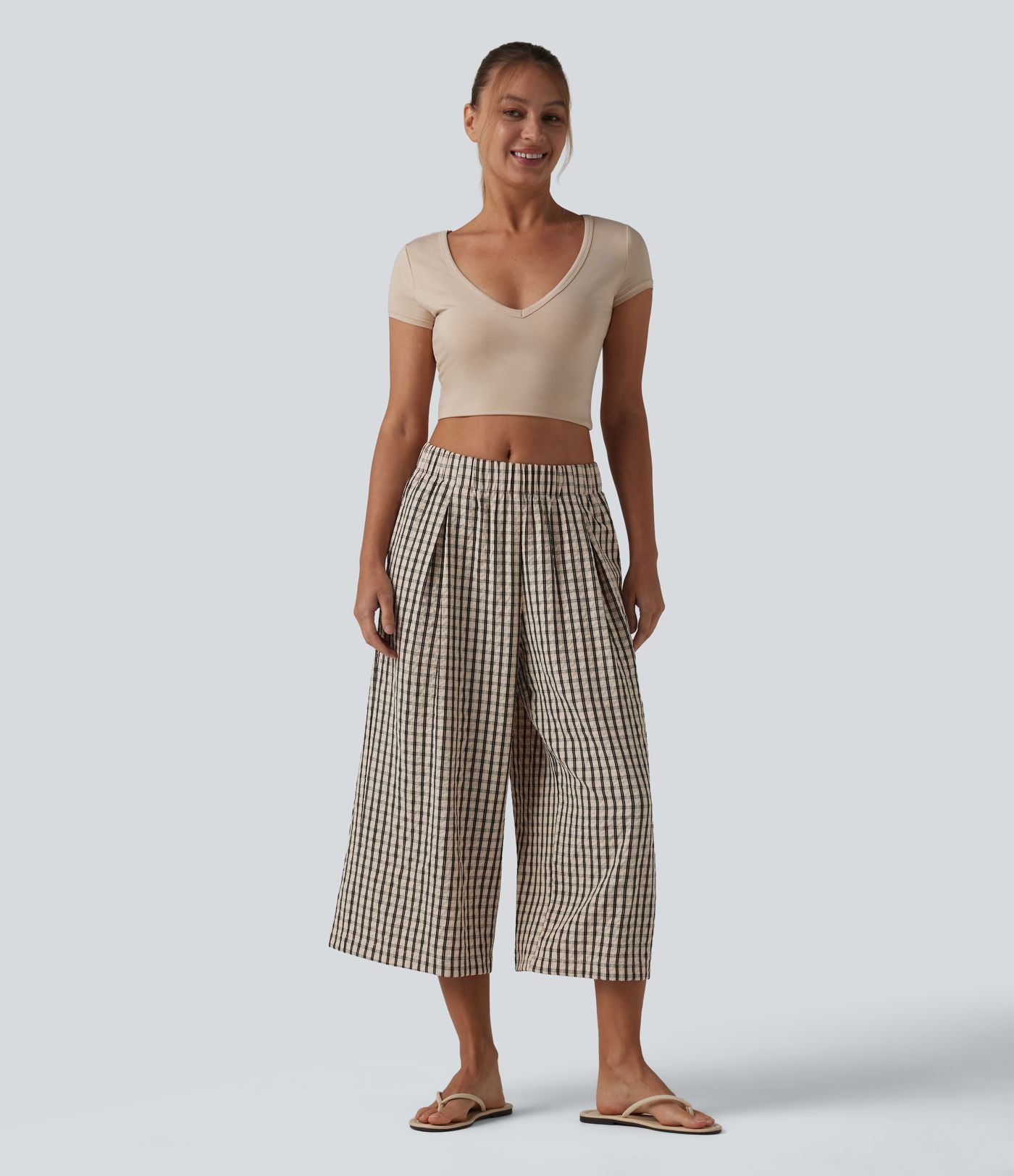 Pantalon ample raccourci à carreaux taille mi-haute avec poches
