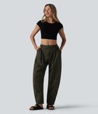 Pantalon léopard décontracté taille mi-haute et jambes fuselées avec poches