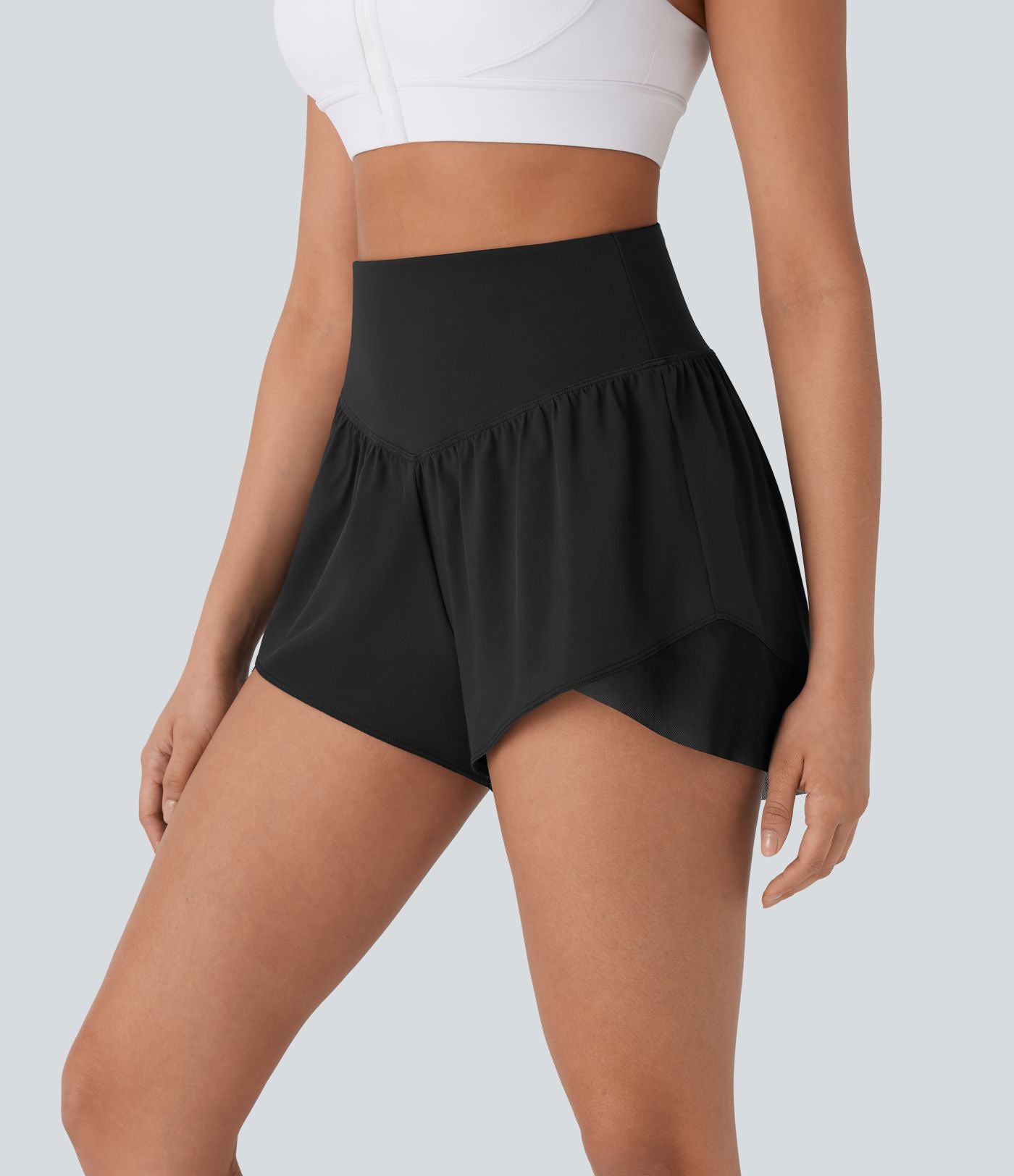 Breezeful™ Short yoga taille haute avec poche arrière ourlet croisé séchage rapide