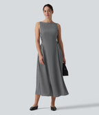 Robe longue fluide casual aspect lin col bateau sans manches à carreaux avec poches