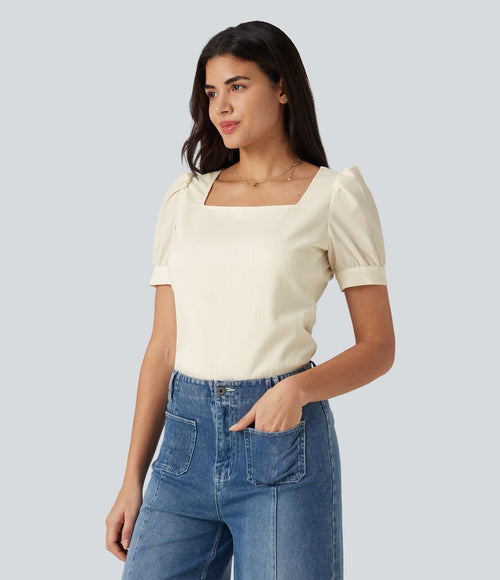 Blouse habillée col carré à manches bouffantes et tissu texturé