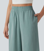 Pantalon ample court taille haute aspect lin avec fentes et poches