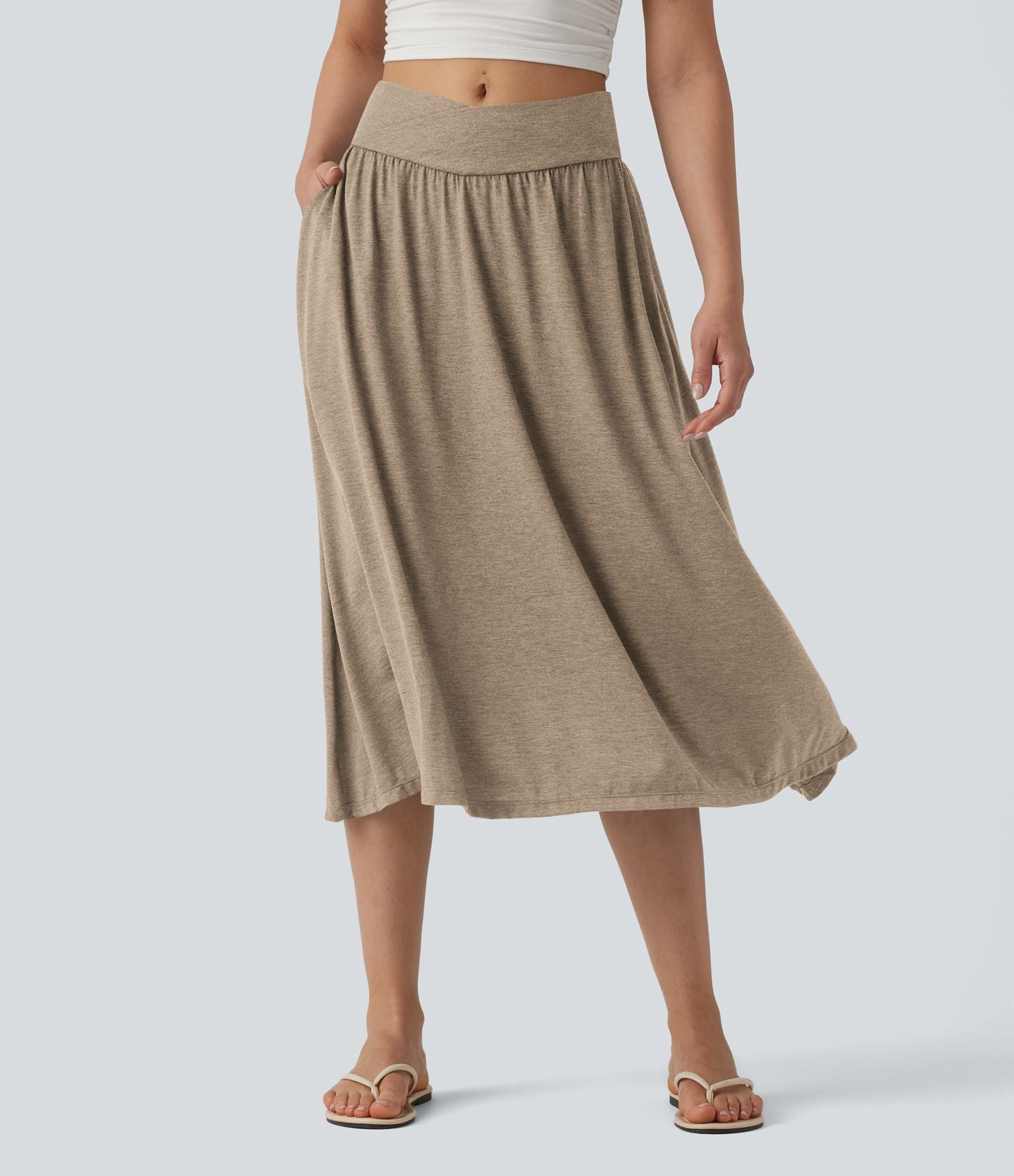 Jupe midi casual fluide croisée taille haute avec poches