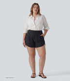 Short rayé grande taille taille haute avec ourlet arrondi et poches