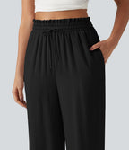 Pantalon effet lin taille haute avec cordon de serrage, bord volanté et poches