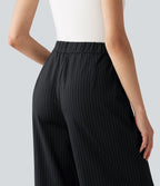 Pantalon tailleur large taille haute à rayures avec boutons décoratifs et poches