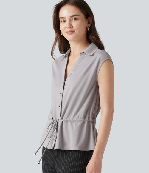 Chemise tailleur sans manches col V avec braguette boutonnée et cordon