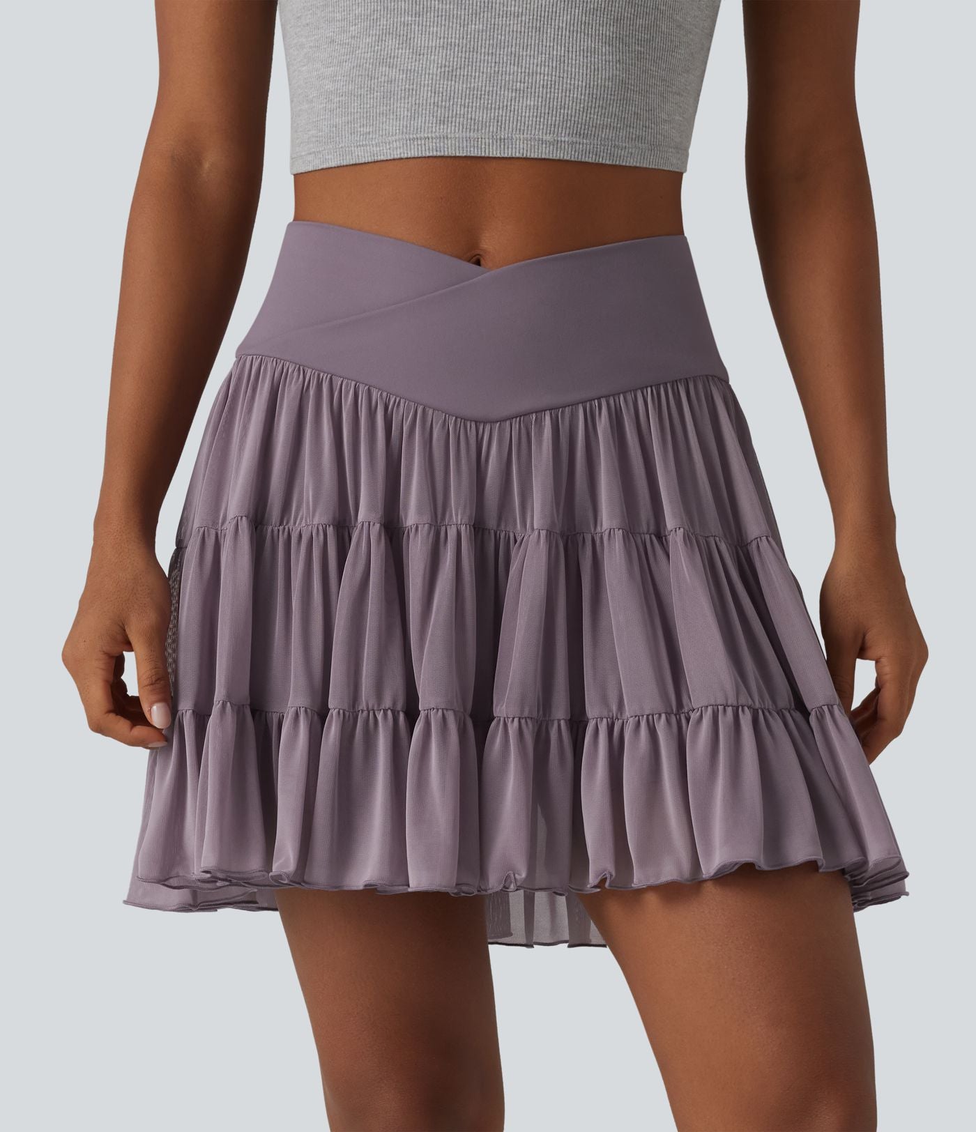 Jupe mini de tennis 2 en 1 croisée évasée taille haute avec poches - longueur allongée