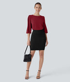 Blouse de travail col bateau avec manches évêque et dos ajouré