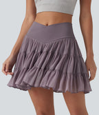 Jupe-short de tennis mini taille haute croisée fluide avec poches