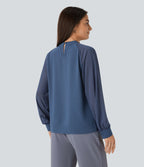 Blouse de travail à col montant avec dos ajouré, manches raglan et empiècements en mesh contrastant