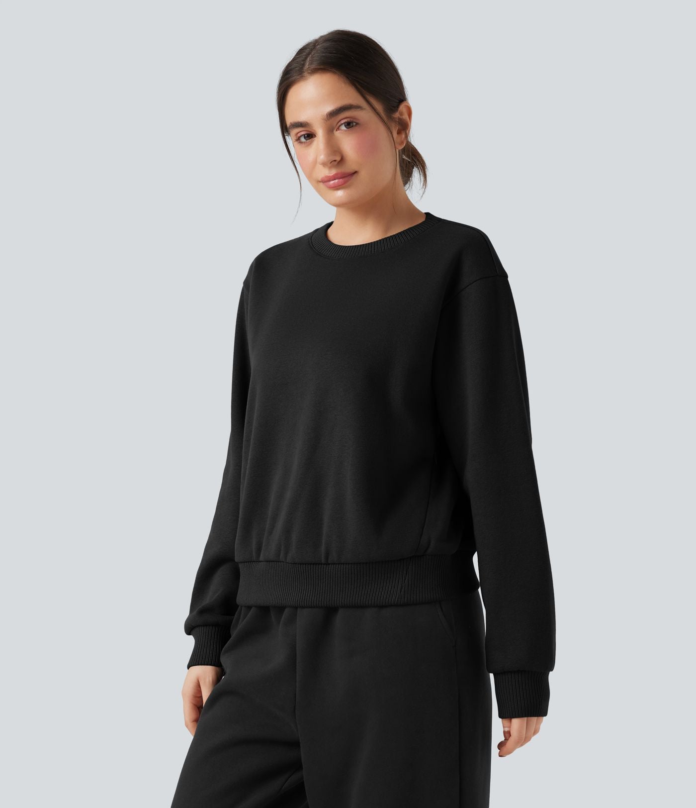 Sweat en coton molleton col rond manches longues avec poches