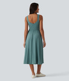 Robe midi fluide sans manches dos croisé, avec brassière intégrée (Bonnets E-G) et poches