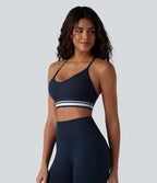 Brassière de sport SoftlyZero™ Plush à maintien léger, dos croisé ouvert, rayures color block et soutien intégré