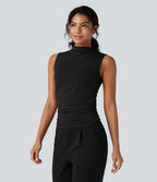 Top tailleur froncé col montant sans manches