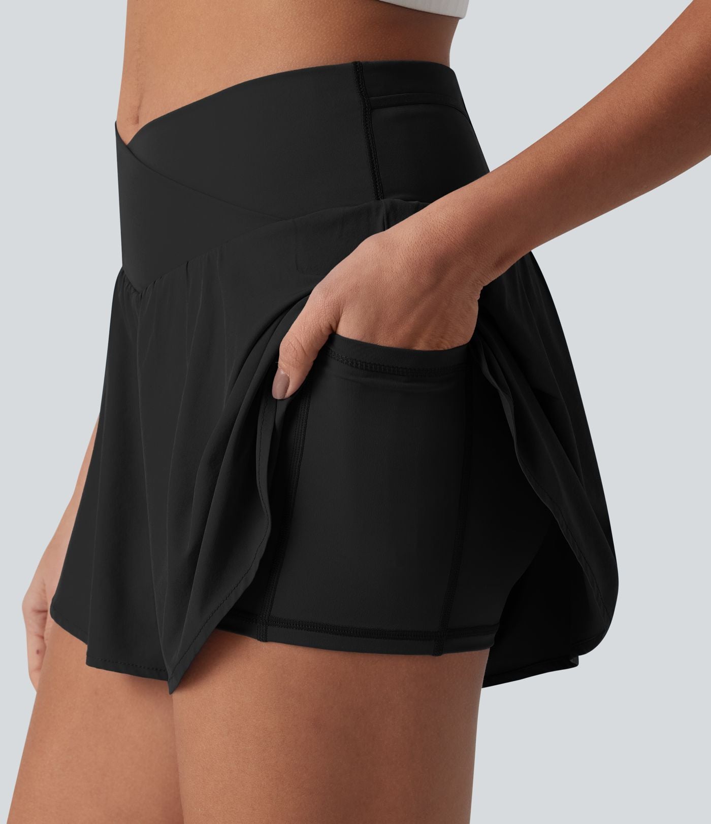 Breezeful™ Short de course 2-en-1 10 cm taille haute croisée à séchage rapide, avec poches
