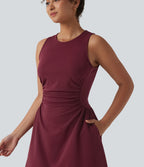Robe tailleur mini sans manches à col rond froncée avec poches
