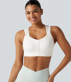 Brassière de sport d'entraînement maintien moyen col rond échancré dos nageur avec fermeture éclair, mesh contrasté et coussinets non amovibles