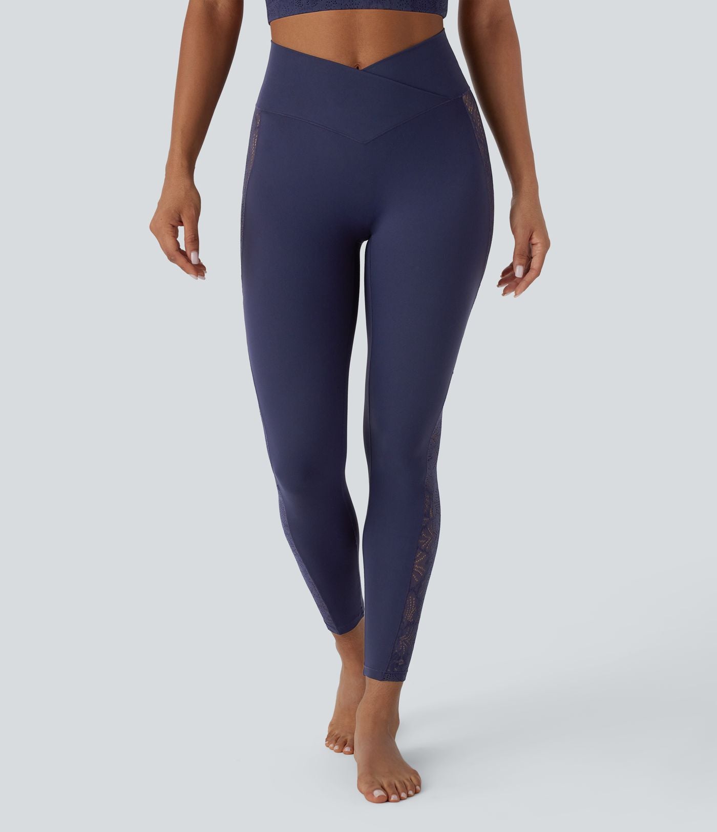 Legging de yoga Softlyzero™ taille haute avec design croisé, dentelle contrastée, sous-vêtement intégré, poche et protection UPF50+