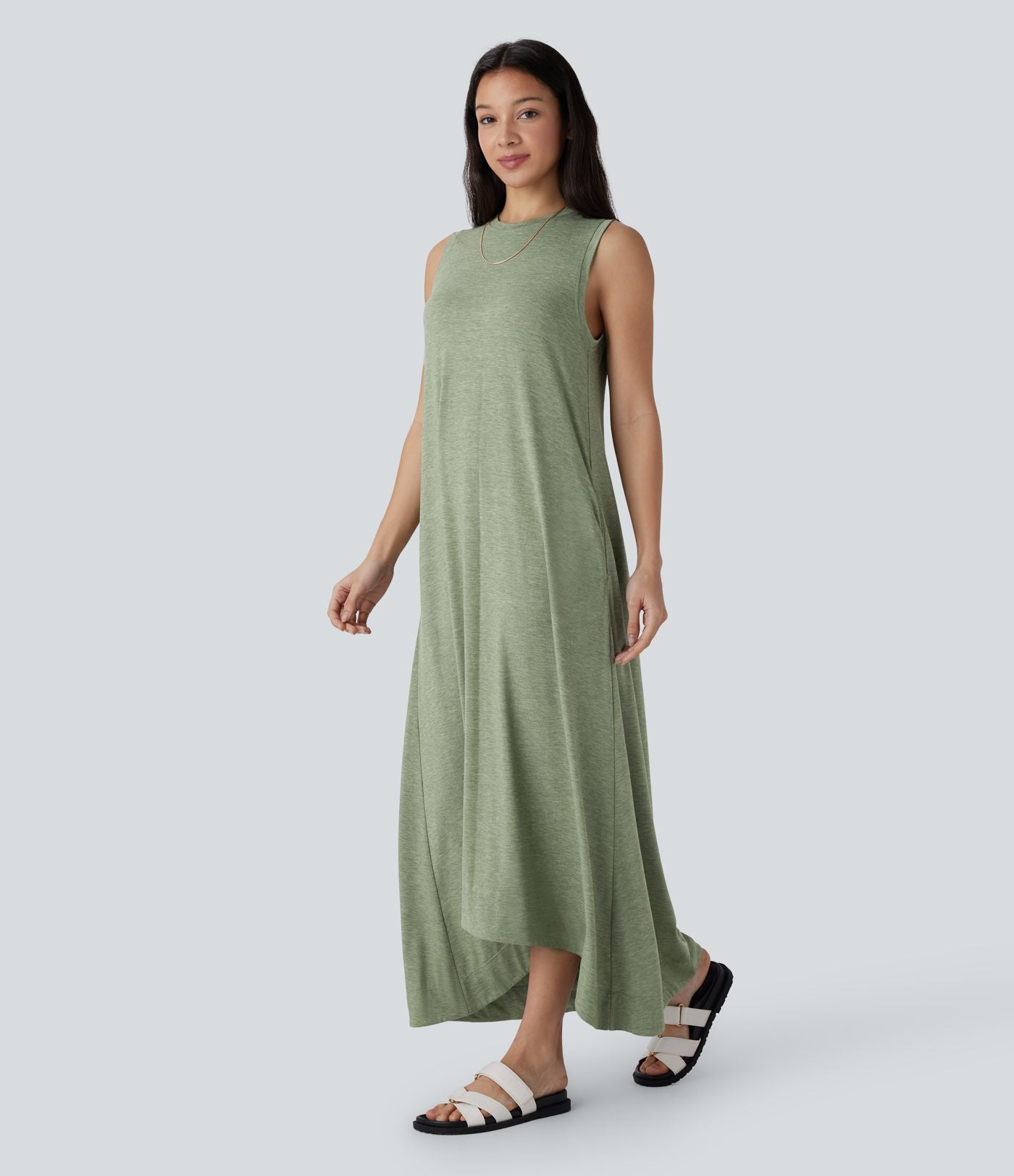 Robe longue décontractée fluide à col rond, sans manches, poches latérales et ourlet asymétrique