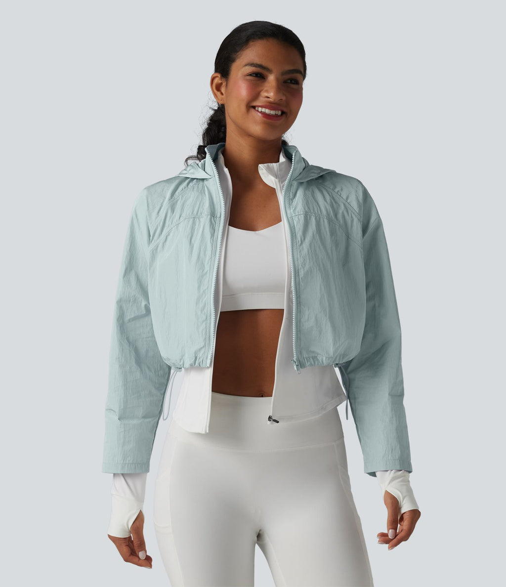 Veste de running 3-en-1 déperlante à capuche avec trous pour les pouces, ourlet arrondi et poches