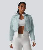 Veste de running 3-en-1 déperlante à capuche avec trous pour les pouces, ourlet arrondi et poches
