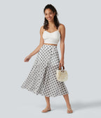 Jupe-short midi fluide évasée taille haute style vacances en mesh à pois avec cordon de serrage et poches