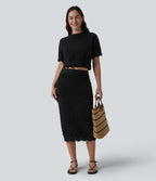 Jupe mi-longue maille ajourée 2-en-1 taille haute avec poches