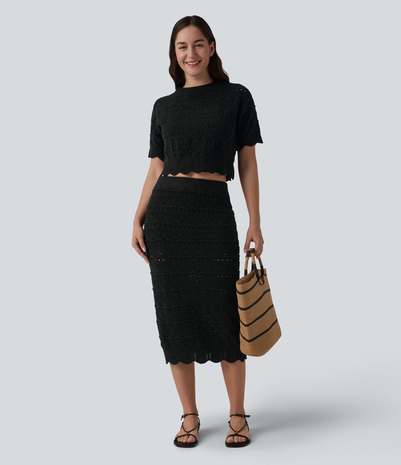 Jupe mi-longue maille ajourée 2-en-1 taille haute avec poches