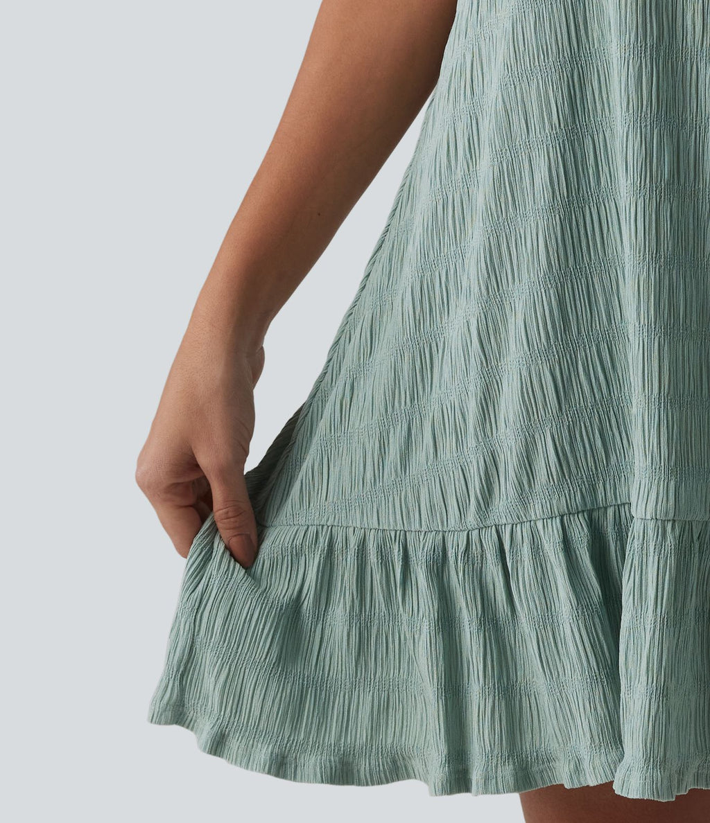 Robe courte décontractée sans manches à col rond, soutien-gorge intégré et ourlet à volants