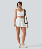 Jupe-short de tennis mini taille haute SoftlyZero™ Airy effet frais InstantCool avec dentelle contrastée, poches et protection solaire UPF50+