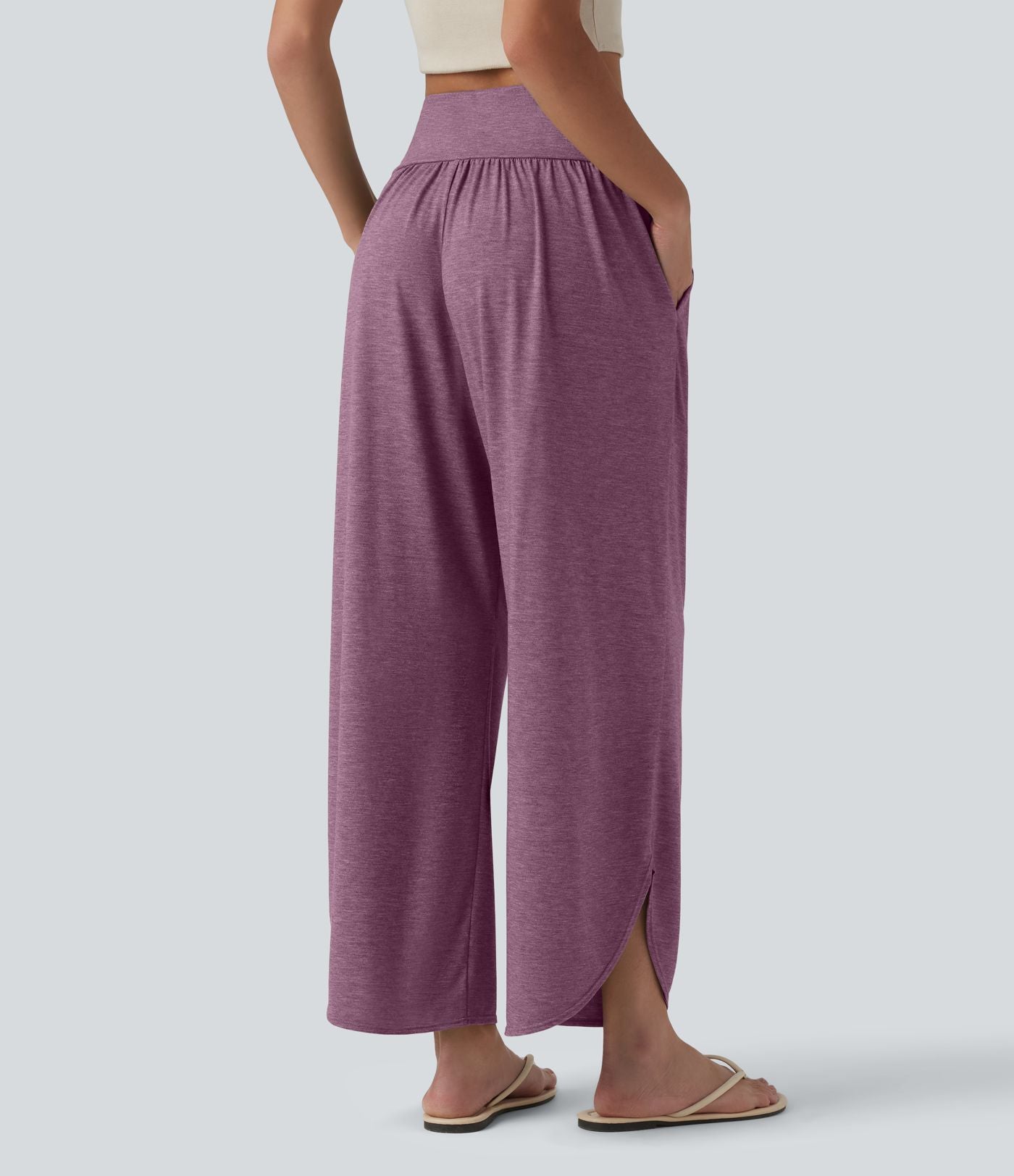 Pantalon décontracté taille haute gainant avec ourlet arrondi et poches