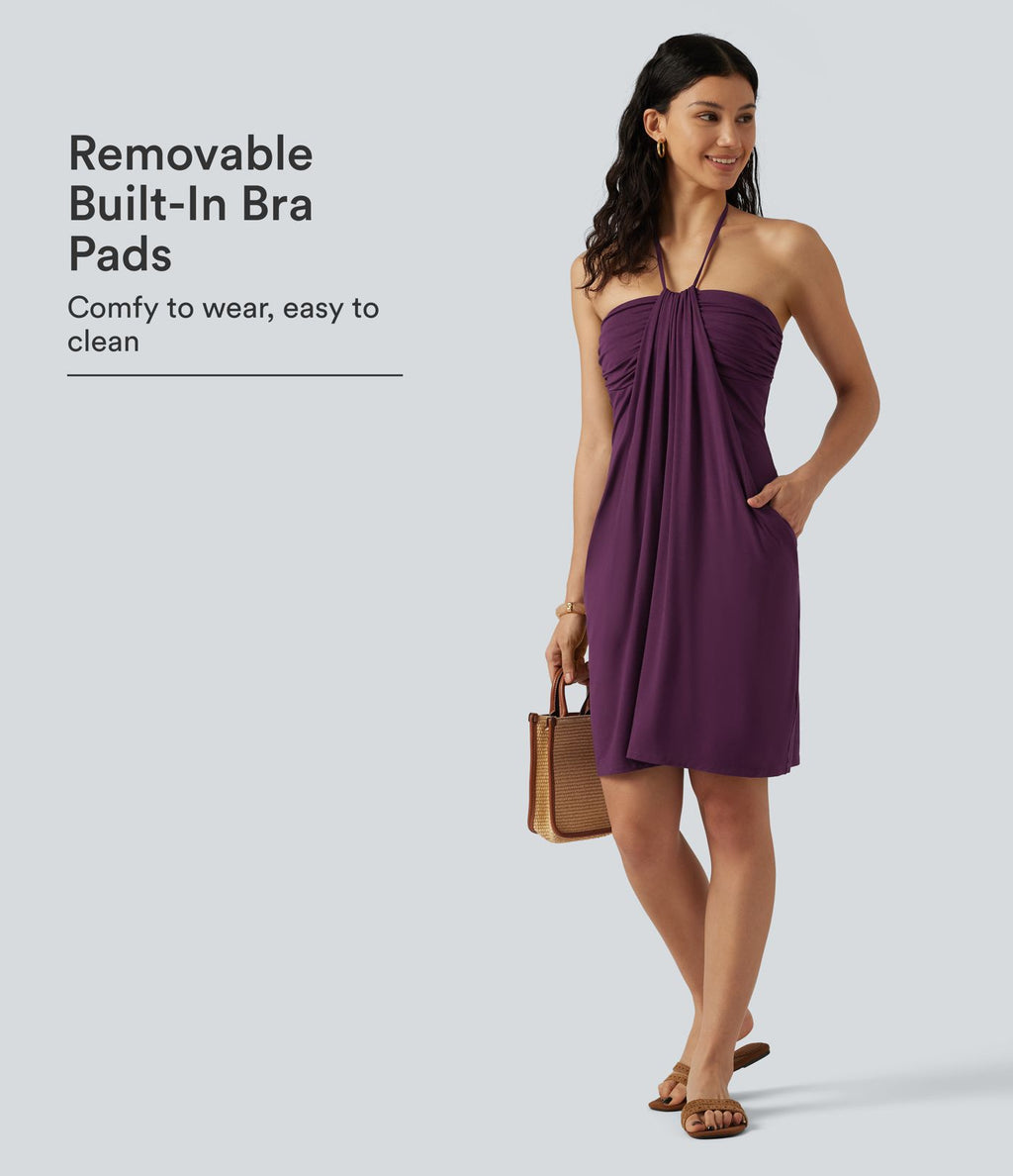 Robe mini de plage à col halter avec brassière intégrée, lien noué au dos et poches