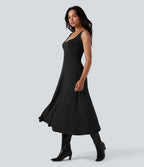 Robe mi-longue fluide col U sans manches avec poches