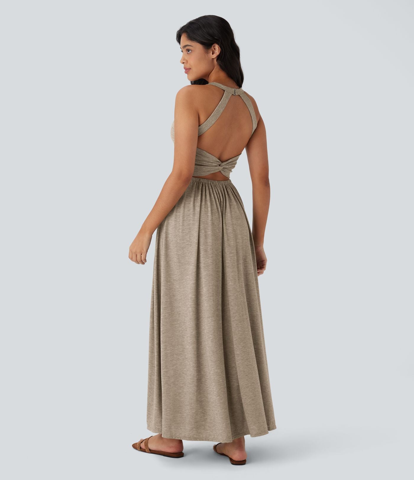 Robe longue fluide fendue avec poches latérales, dos nu et effet torsadé