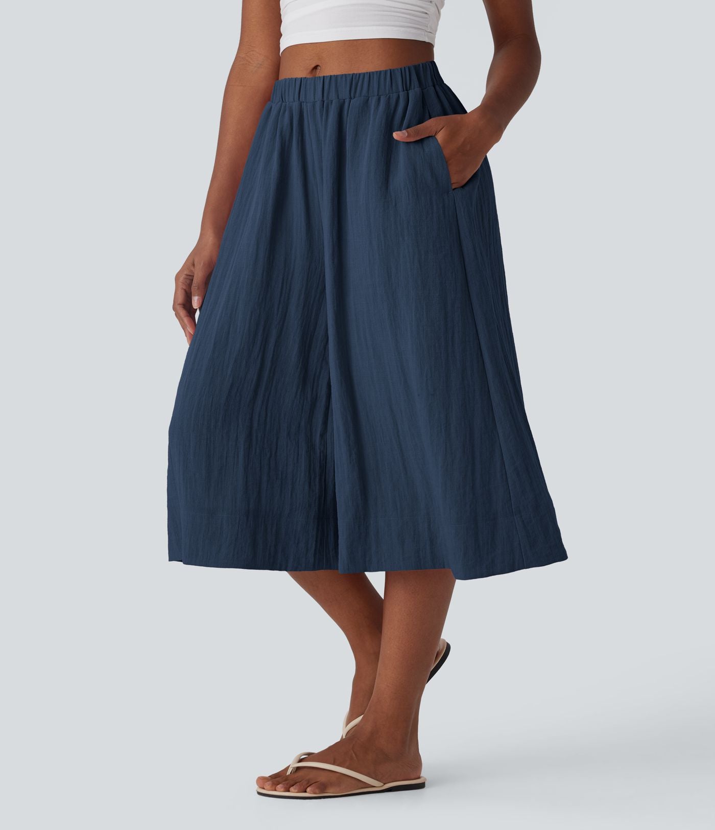 Pantalon fluide large taille mi-haute effet lin avec poche