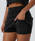 Jupe-short courte en maille ajourée taille haute avec poches latérales