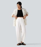 Pantalon tailleur ample, taille haute, coupe ballon, à poches