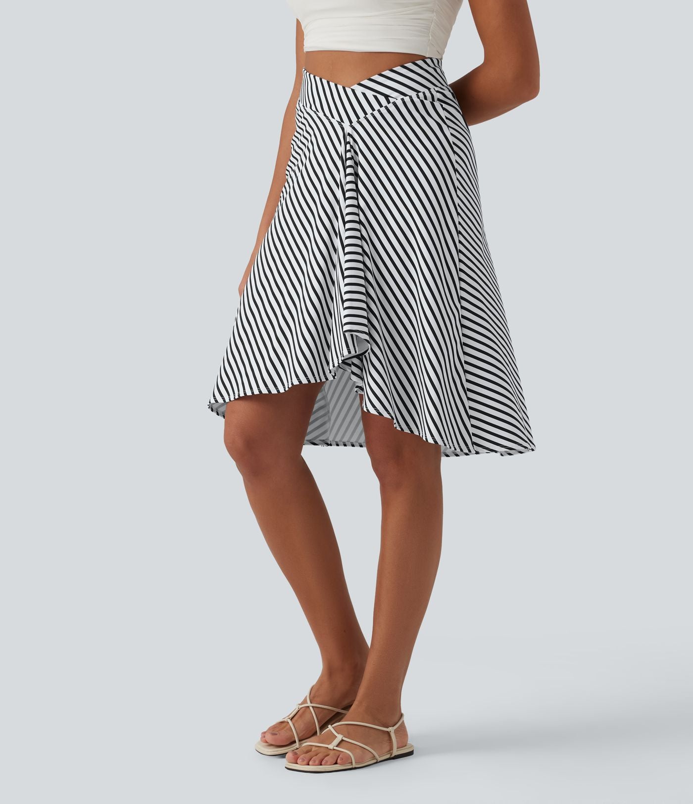 Jupe resort taille haute croisée ourlet asymétrique