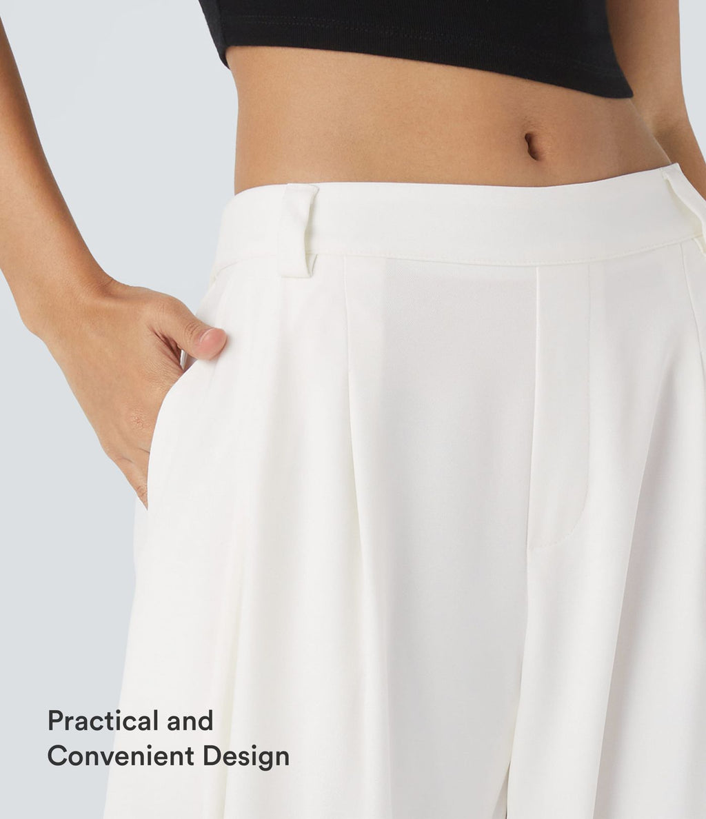 Pantalon tailleur ample, taille moyenne, coupe barrel, à poches