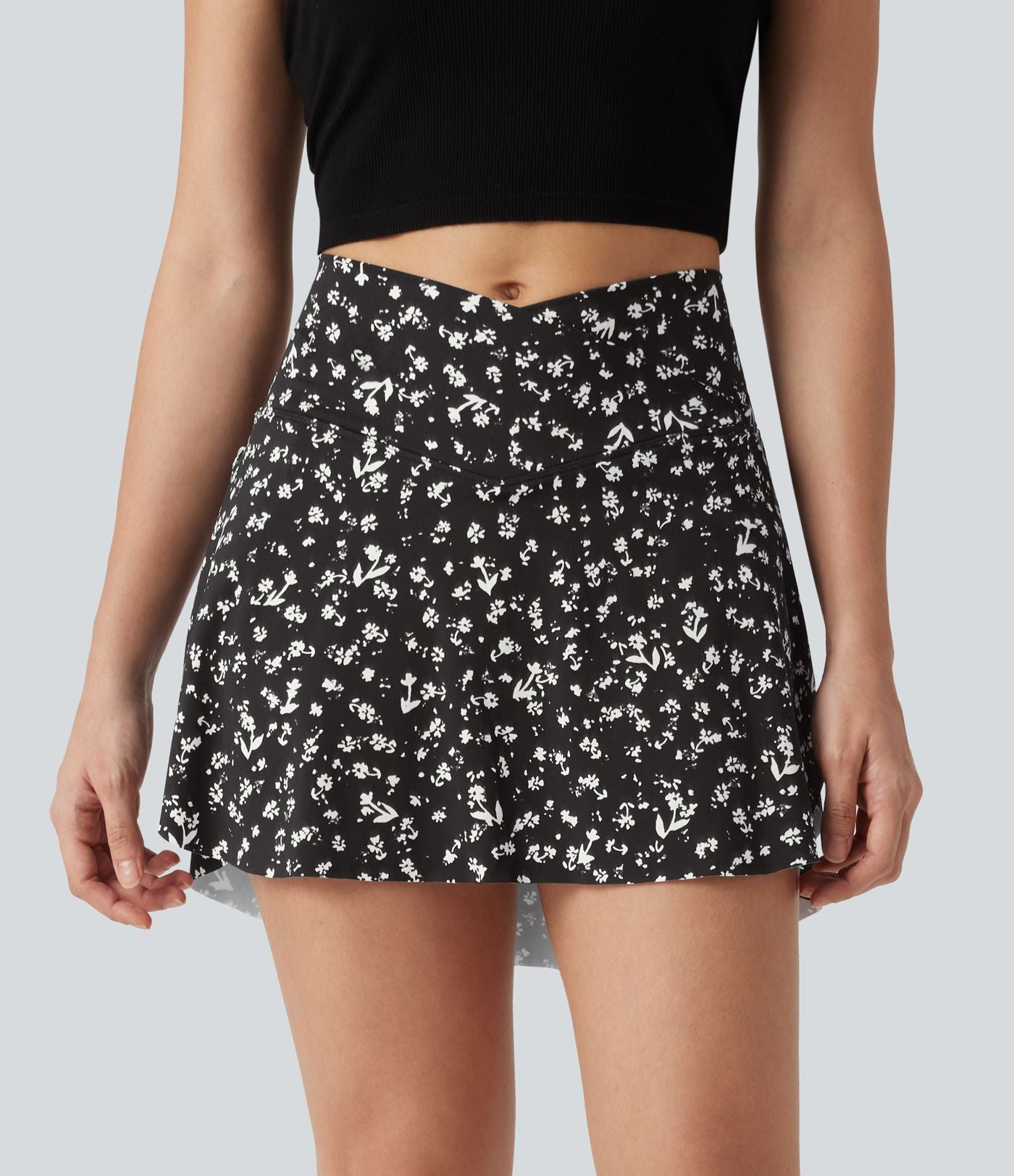 Jupe-short de tennis mini taille haute croisée imprimé léopard avec poches