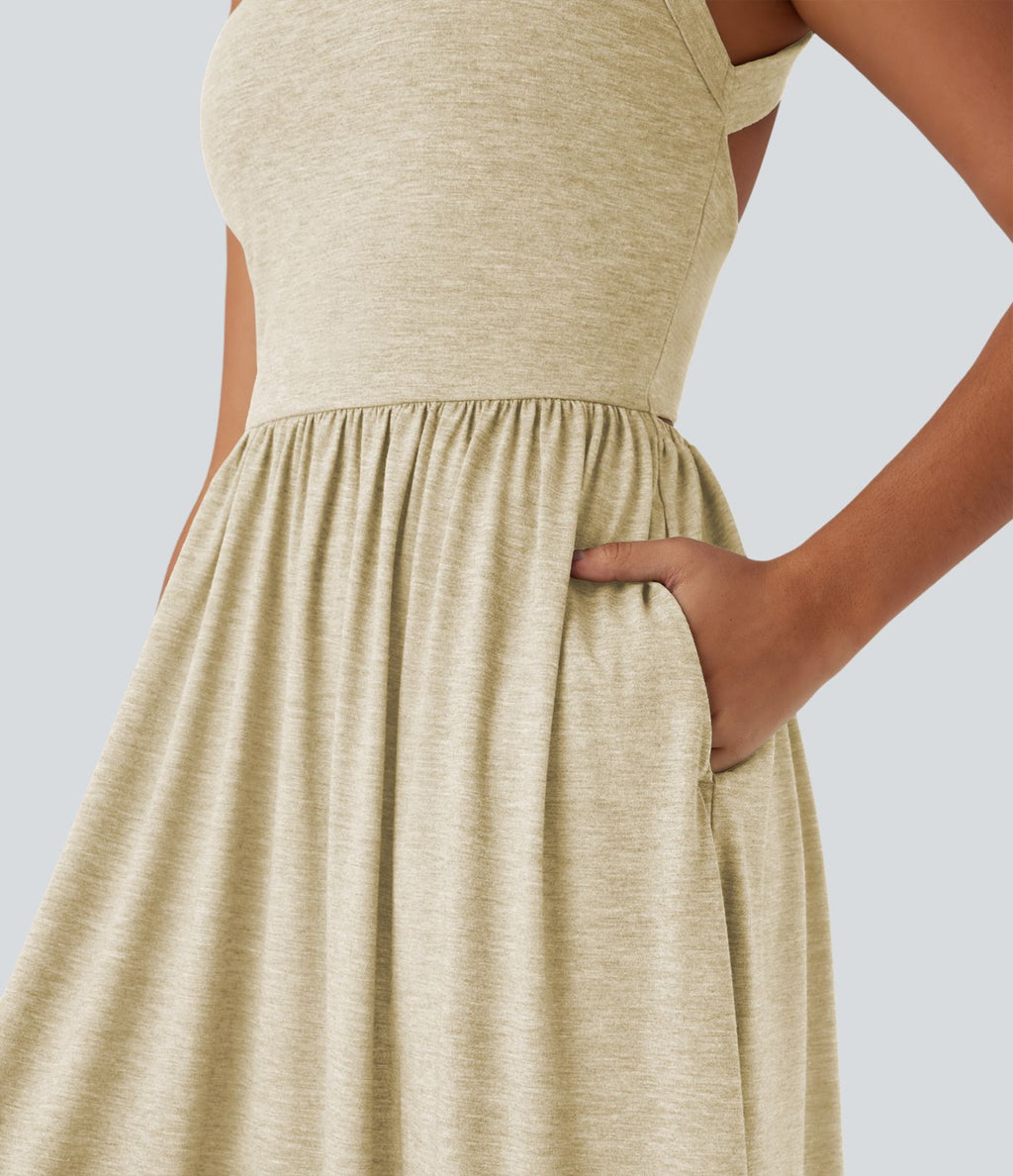 Robe longue fluide fendue avec poches latérales, dos nu et effet torsadé