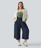 Pantalon grande taille large fluide taille haute avec cordon de serrage, poches et aspect lin